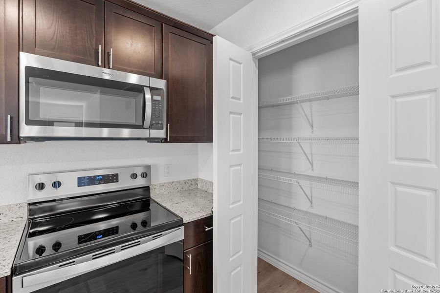 Furnished interior view inside a new home in Vista Real, Converse (Image 11).