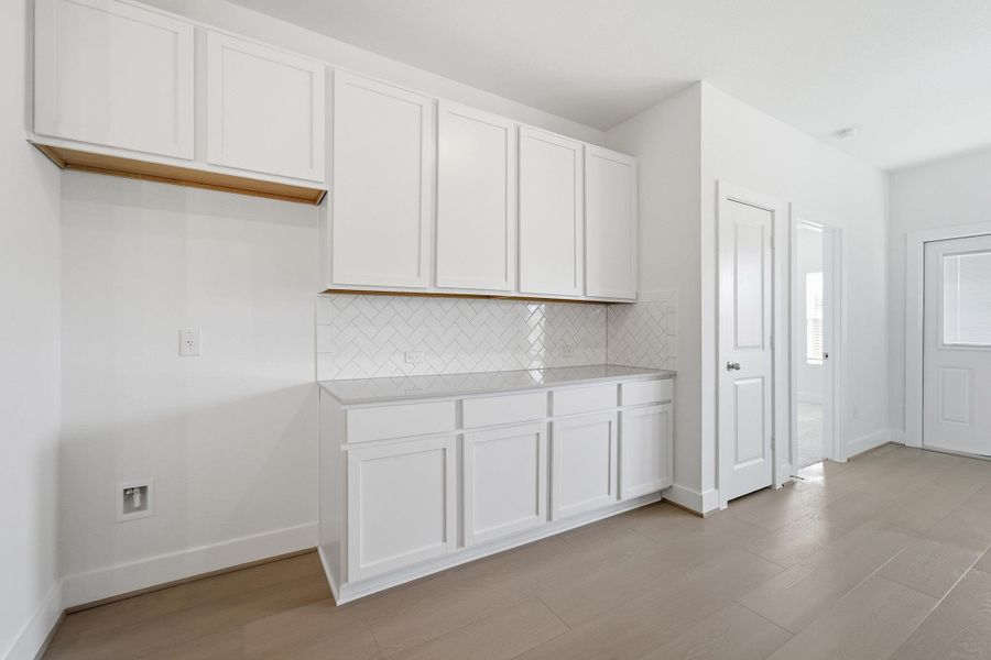 Furnished interior view inside a new home in Sunfield, Buda (Image 17).