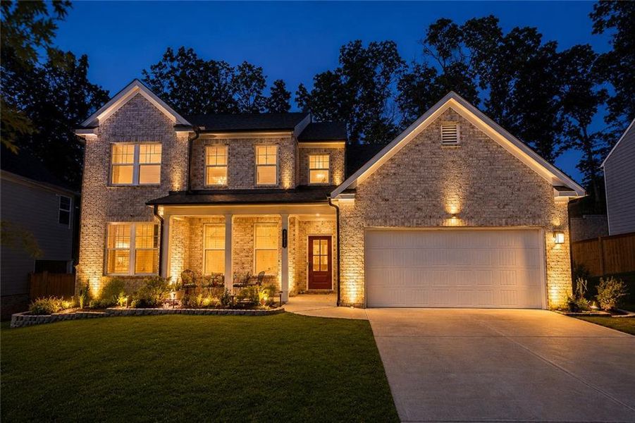 Front exterior of a new home in , Lawrenceville, GA, highlighting curb appeal (Image 2). Front exterior of a new home in , Lawrenceville, GA, highlighting curb appeal (Image 2).