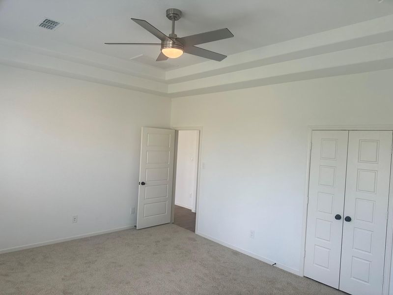 Spacious, unfurnished interior of a new home in Creekhaven, Iowa Colony (Image 23).