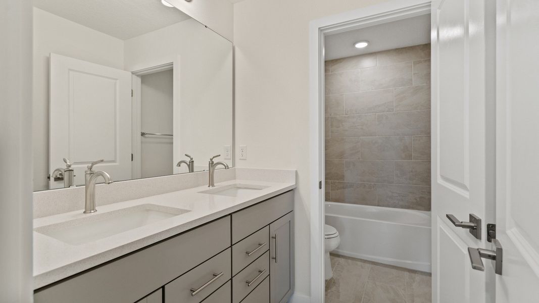 The Naples Second Floor Second Bathroom in Quick Move-In Home at Willowbrook North by DRB Homes in Winter Haven, FL The Naples Second Floor Second Bathroom in Quick Move-In Home at Willowbrook North by DRB Homes in Winter Haven, FL