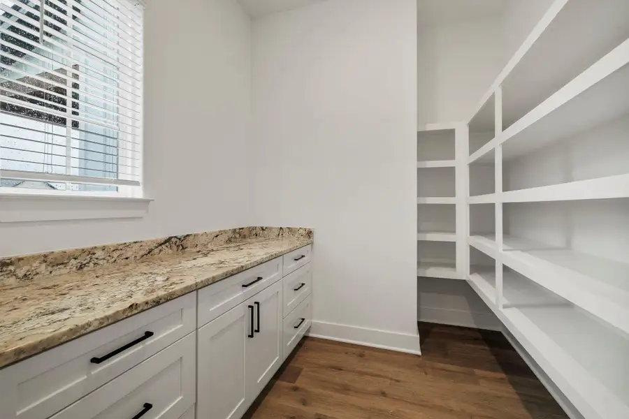 Furnished interior view inside a new home in Magnolia Woods - 70', Magnolia (Image 11). Furnished interior view inside a new home in Magnolia Woods - 70', Magnolia (Image 11).