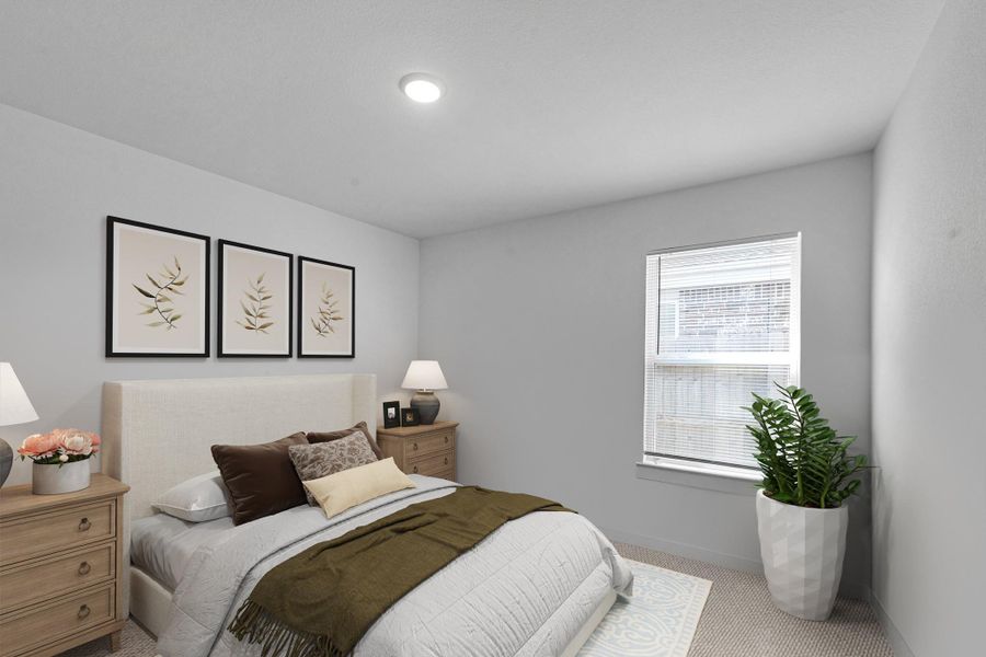Bright and inviting secondary bedroom perfect for guests, family, or a flex space. Photo may be virtually staged