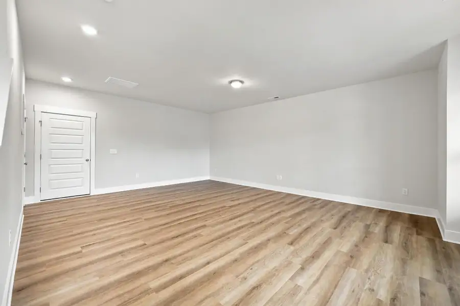 Spacious, unfurnished interior of a new home in Allen Park, Raleigh (Image 22).