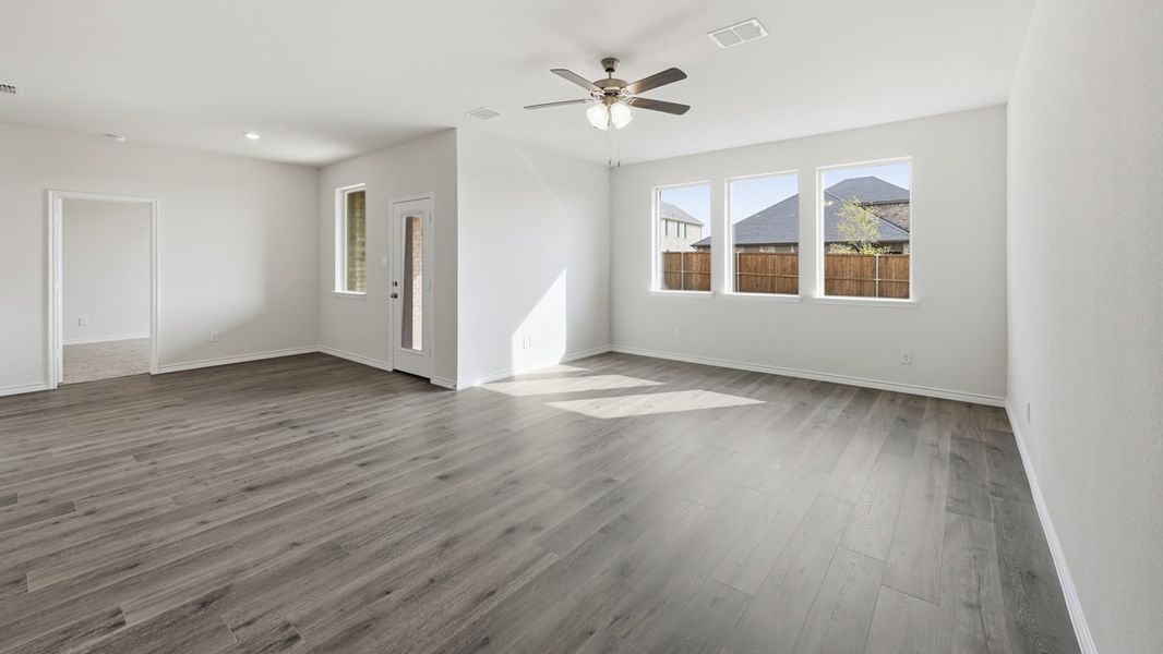 Representative unfurnished interior of a home built from the H204 Medbourne by D.R. Horton in Lilybrooke at Legacy Hills, Celina (Image 7).