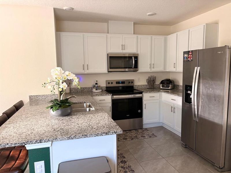 Furnished interior view inside a new home in Kindred, Kissimmee (Image 7).