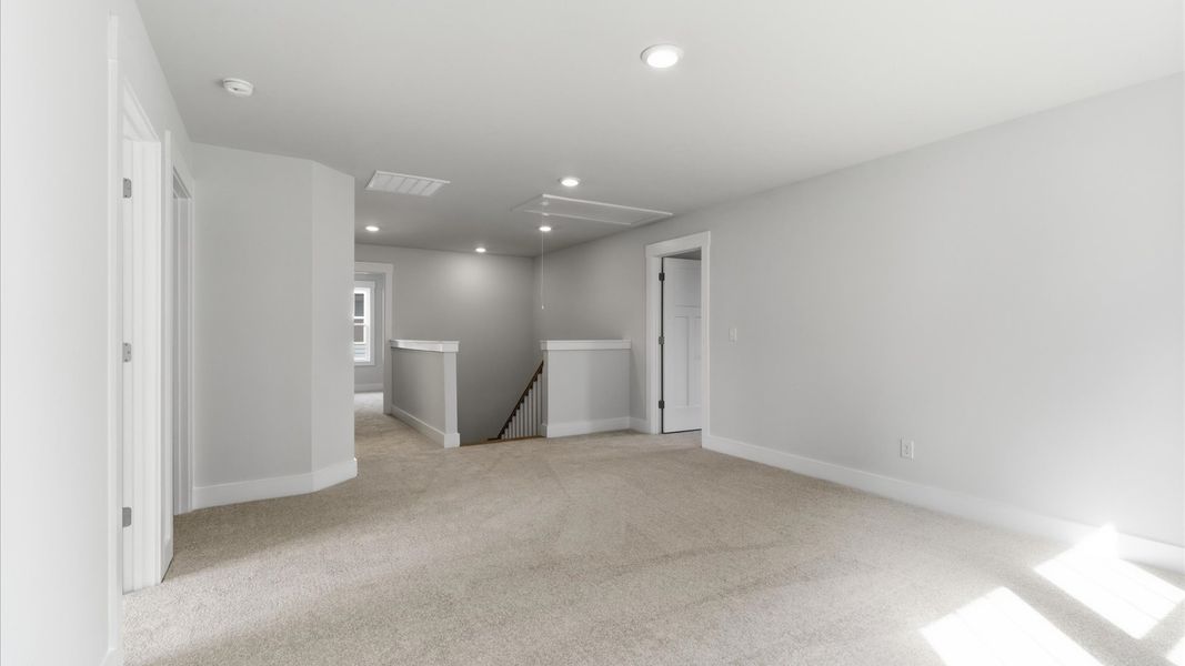 Memorable upstairs loft with plush carpeting and a bright, welcoming atmosphere at this single family home in Gray Court, SC