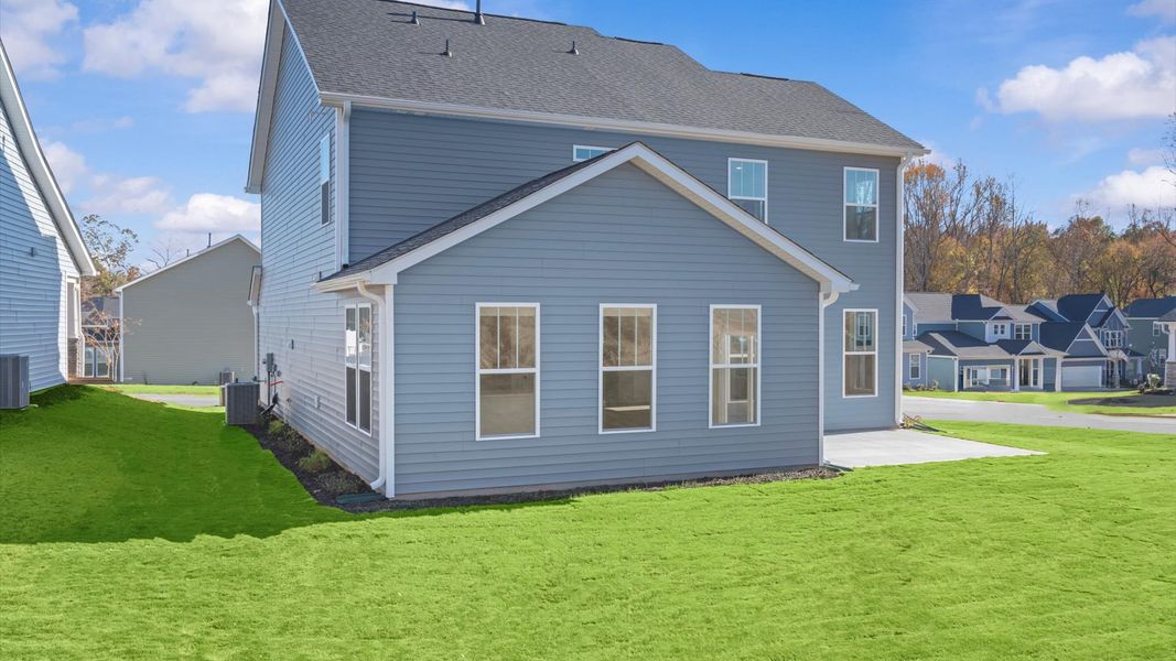 Exterior details and patio area of a home in Fox Hollow, Spartanburg (Image 21).