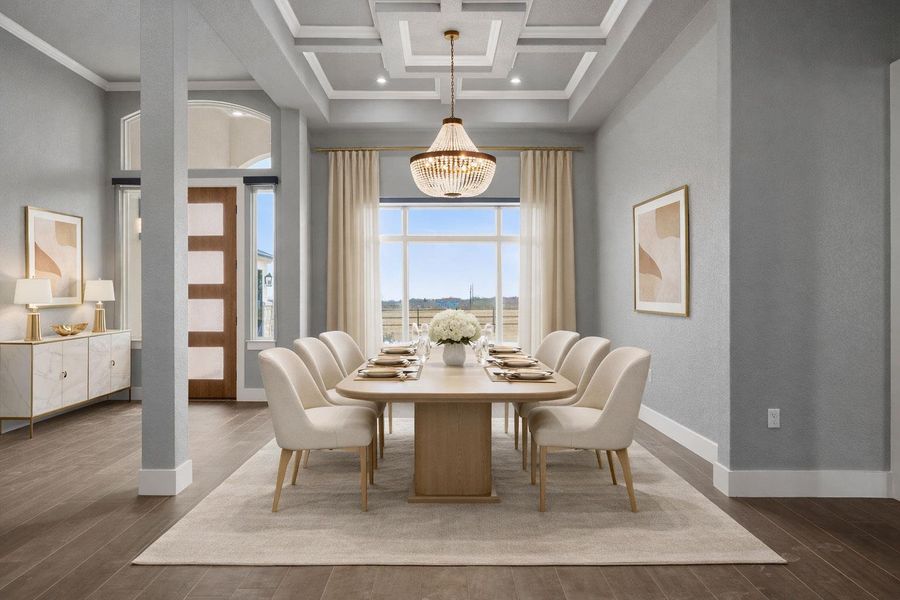Formal Dining room  by the entrance - featuring coffered ceiling and dark wood-type flooring