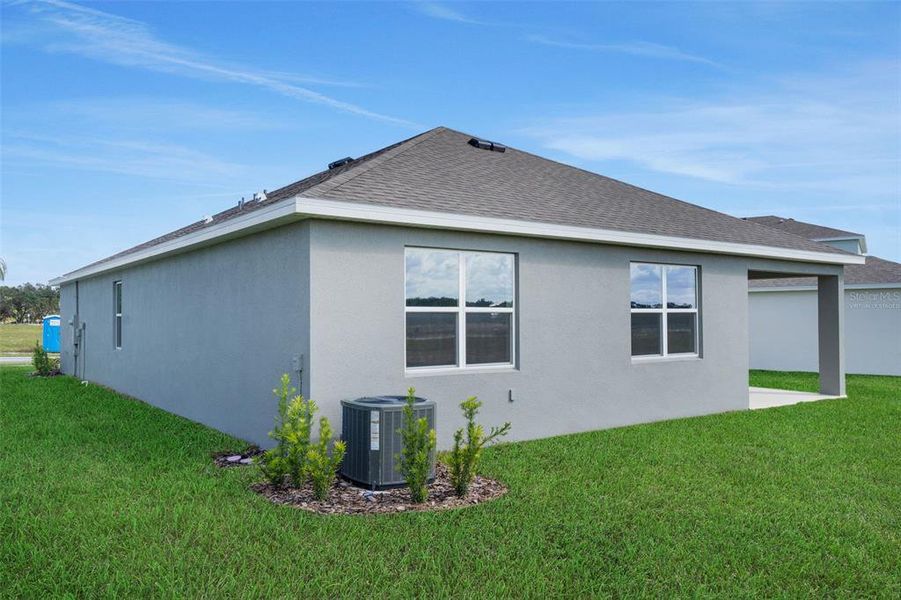 Exterior details and patio area of a home in Reserve at Hammock Oaks, Lady Lake (Image 3).