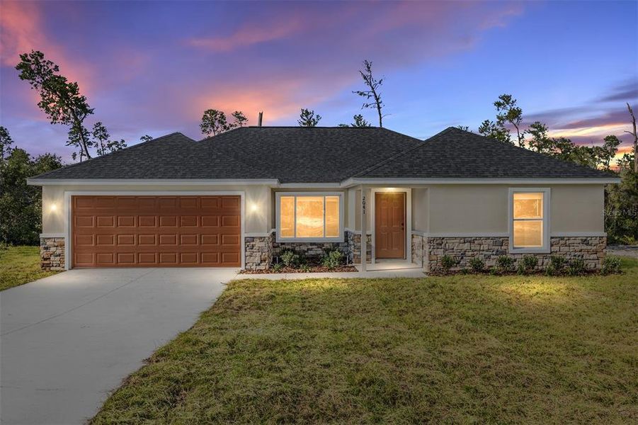 Front exterior of a new home in , Ocala, FL, highlighting curb appeal (Image 28).
