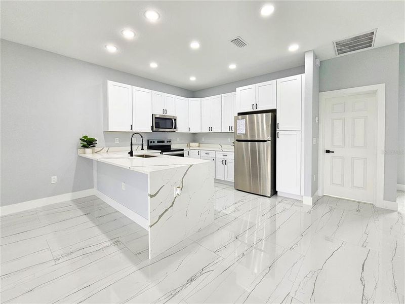 Furnished interior view inside a new home in , Lehigh Acres (Image 6).