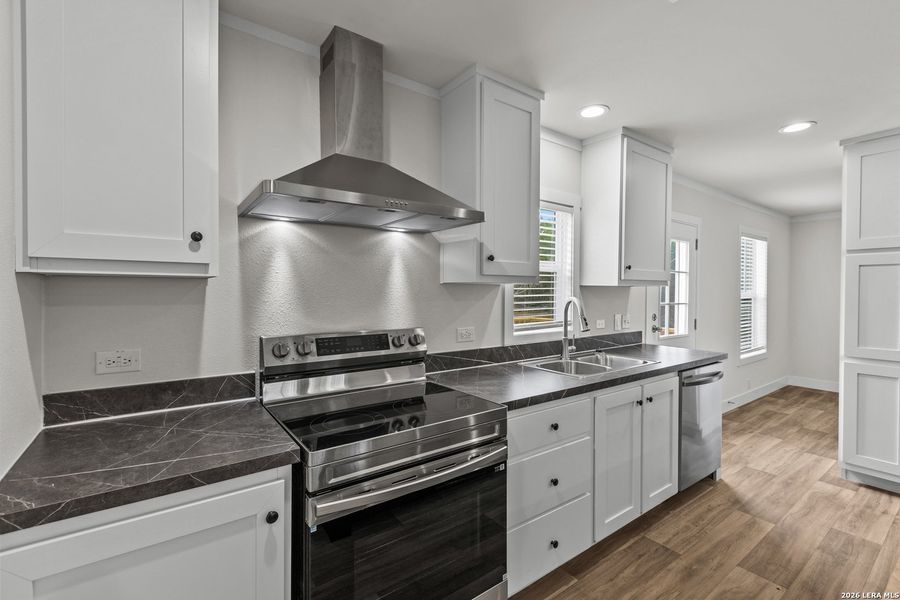 Furnished interior view inside a new home in , Devine (Image 6).