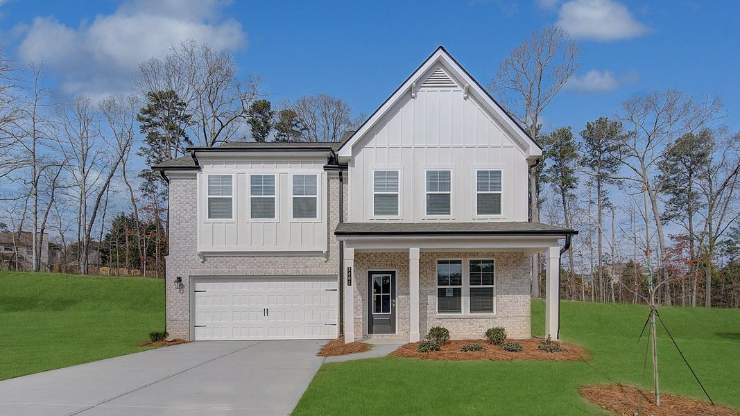 Front exterior of a new home in Hamilton Lakes, Loganville, GA, highlighting curb appeal (Image 1). Front exterior of a new home in Hamilton Lakes, Loganville, GA, highlighting curb appeal (Image 1).