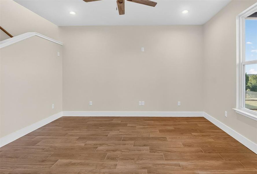 spacious living area with ceramic tile flooring