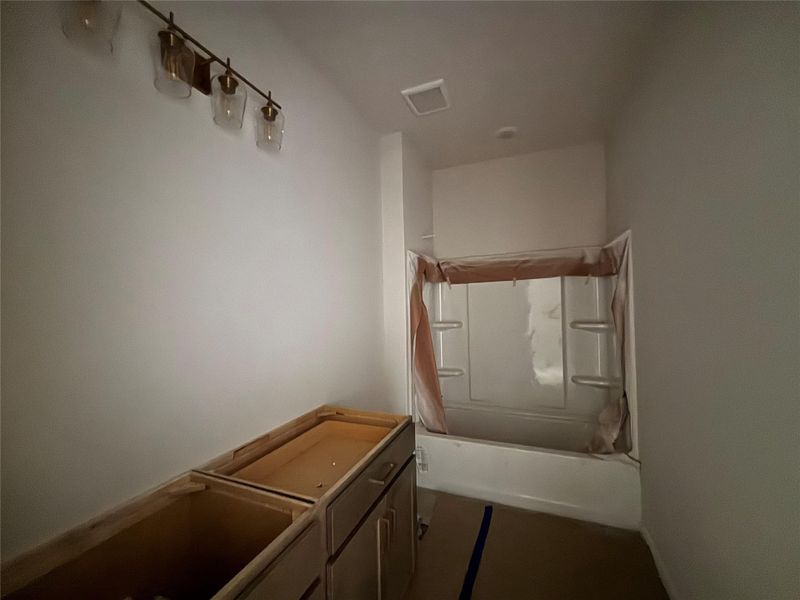 Furnished interior view inside a new home in Covered Bridge, Hutto (Image 8). Furnished interior view inside a new home in Covered Bridge, Hutto (Image 8).