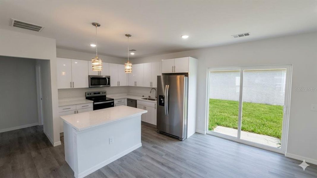 Furnished interior view inside a new home in , Kissimmee (Image 6). Furnished interior view inside a new home in , Kissimmee (Image 6).