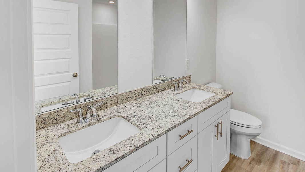 Representative furnished interior of a home built from the Lismore by D.R. Horton in Ashton Park Phase III, Freeport (Image 11).