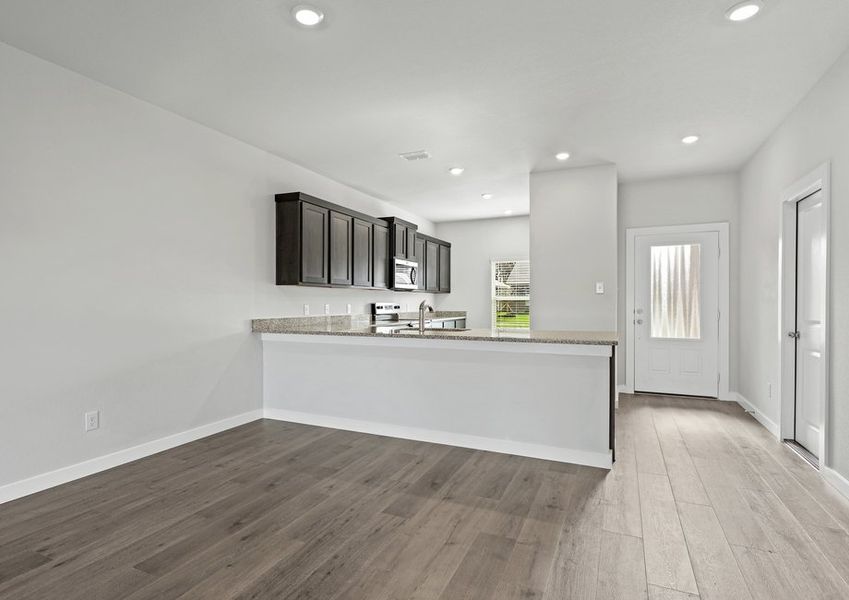 The dining room sits right off of the kitchen.