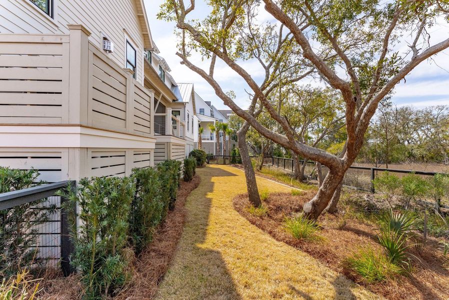 Exterior details and patio area of a home in Daniel Island Park, Charleston (Image 39).