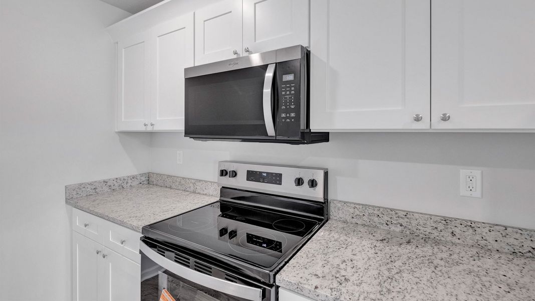 Furnished interior view inside a new home in Riggs Pointe, Millington (Image 6).
