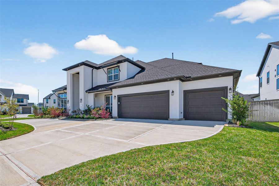 Front exterior of a new home in , Missouri City, TX, highlighting curb appeal (Image 25).