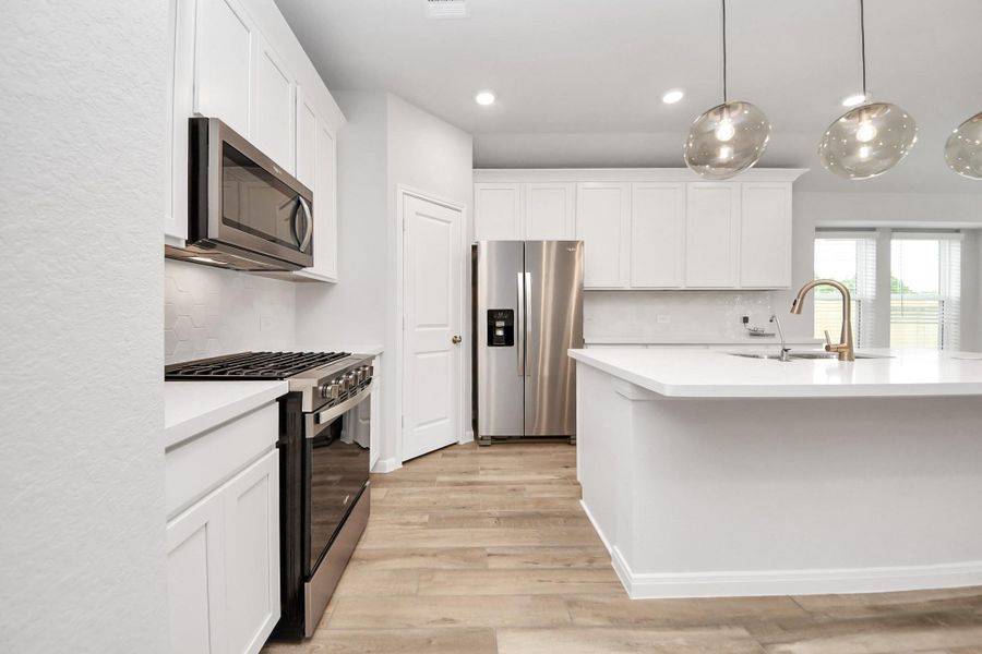 Furnished interior view inside a new home in Sunrise Cove: Landmark Collection, Texas City (Image 4).