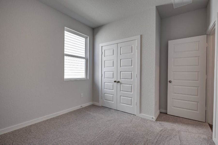 A room with white doors. A room with white doors.