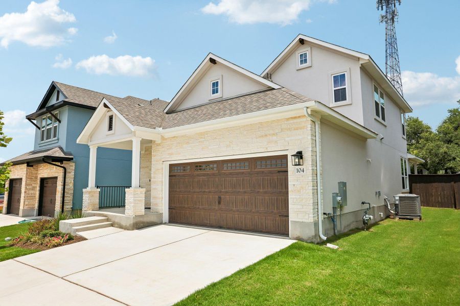 Front exterior of a new home in Clear Creek, Round Rock, TX, highlighting curb appeal (Image 27).