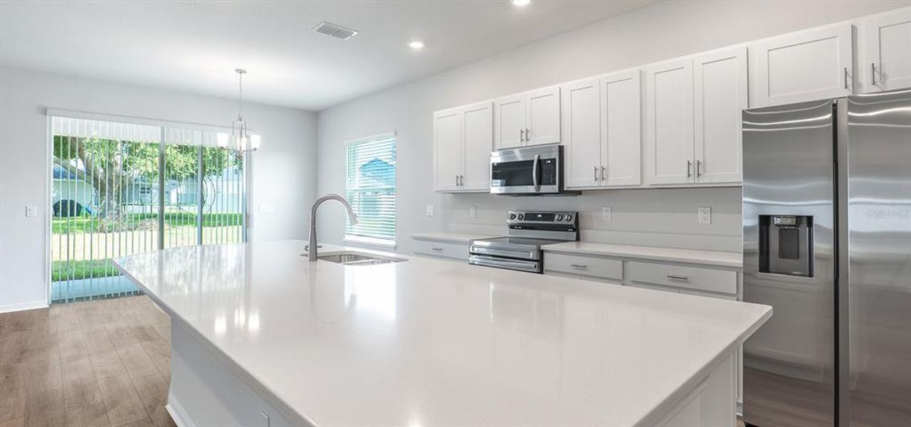 Furnished interior view inside a new home in Otter Woods Estates, Auburndale (Image 4).