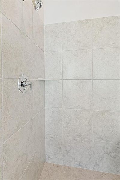 Bathroom with tiled shower