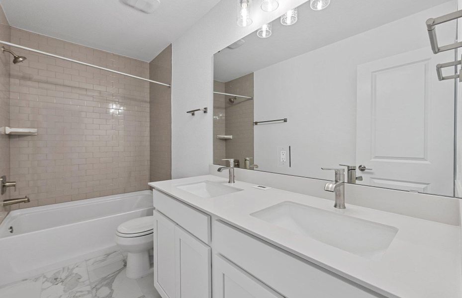 Furnished interior view inside a new home in Wolf Ranch, Georgetown (Image 19).