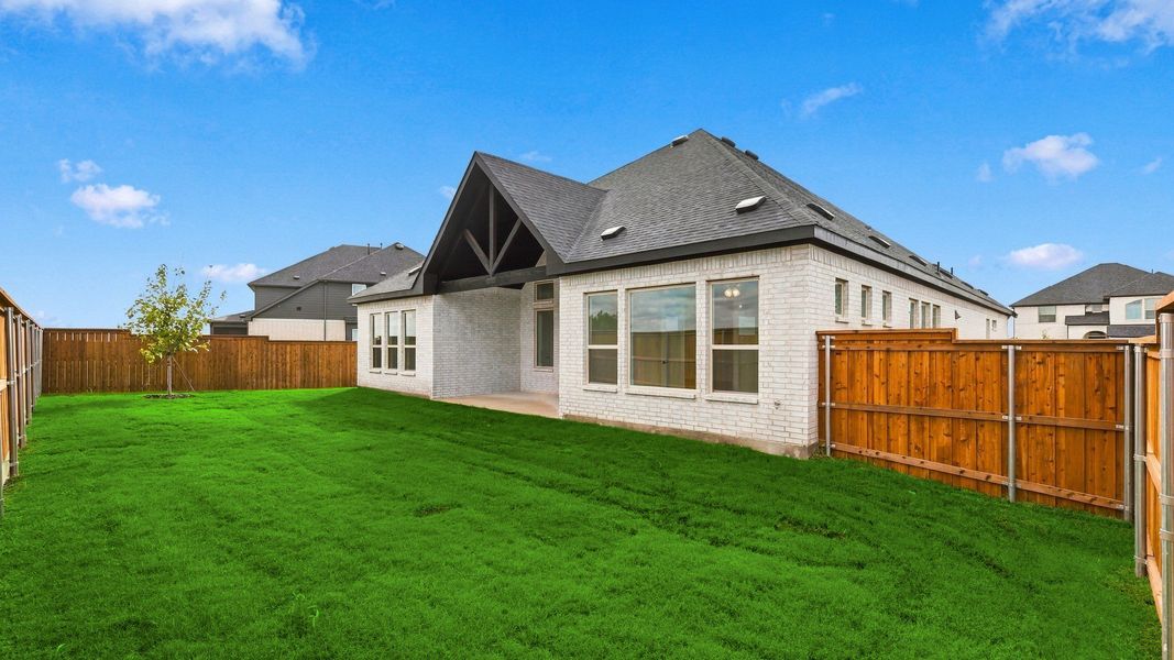 Exterior details and patio area of a home in Green Meadows Classic, Celina (Image 24).