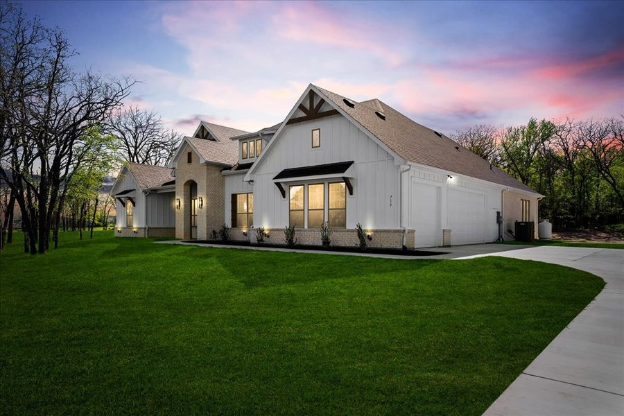 Front exterior of a new home in Spring Valley Ranch, Paradise, TX, highlighting curb appeal (Image 30).