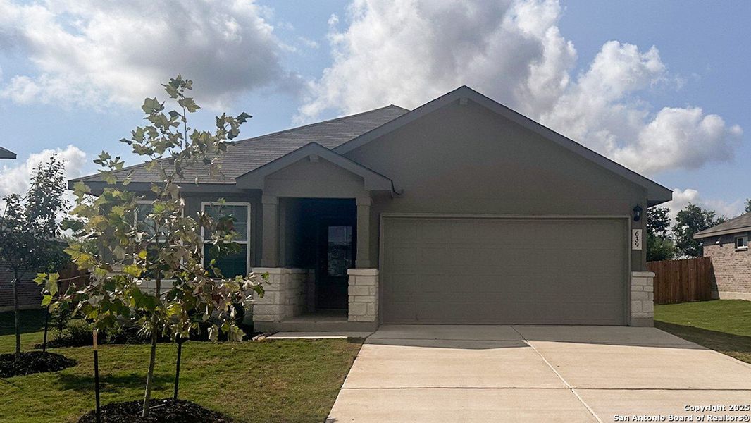 Front exterior of a new home in Steele Creek, Cibolo, TX, highlighting curb appeal (Image 12).