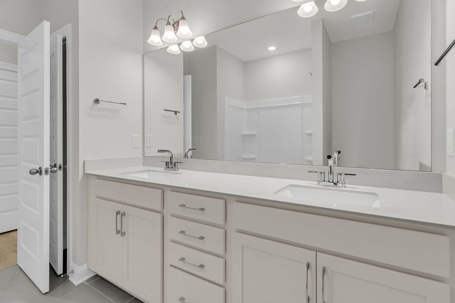 Furnished interior view inside a new home in Tidewater at Lakes of Cane Bay, Summerville (Image 17).