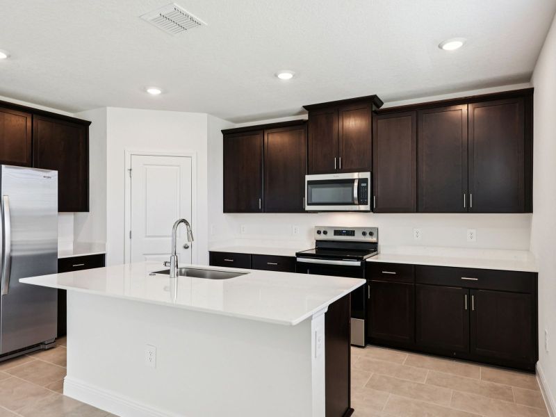 Furnished interior view inside a new home in The Reserve at Hammock Oaks - Signature Series, Lady Lake (Image 4).