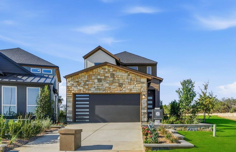 Representative exterior photo of a completed home built from the Pegasus – HD by Chesmar Homes in Prominence – Now Selling, San Antonio, TX (Image 7).