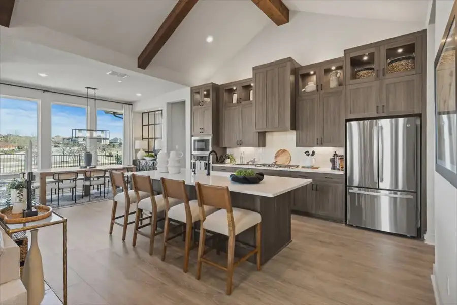Representative furnished interior of a home built from the Malani by Chesmar Homes in Lakes of Cane Island, Katy (Image 5).