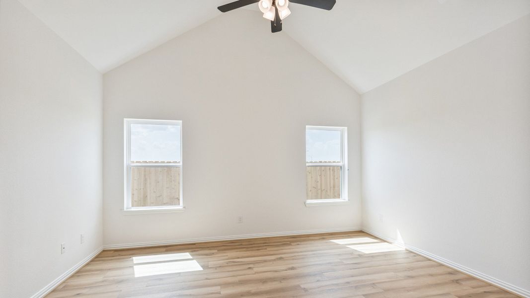 Furnished interior view inside a new home in Creekhaven, Iowa Colony (Image 12).