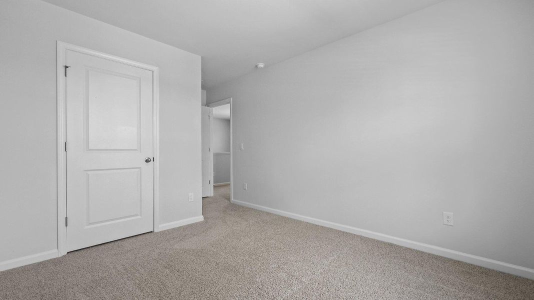 Spacious, unfurnished interior of a new home in Pine Hills at Cane Bay, Summerville (Image 32).