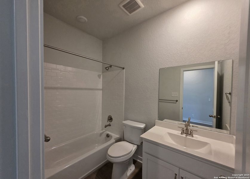 Furnished interior view inside a new home in The Summit at Saddlebrook Ranch 55's, Schertz (Image 5).