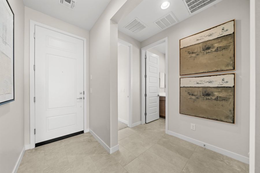 Front Door, Entry into Bed 3 & Bath 2 | Radiance Floorplan | Elara at Moonlight | New Homes in Maricopa, AZ by Landsea Homes Front Door, Entry into Bed 3 & Bath 2 | Radiance Floorplan | Elara at Moonlight | New Homes in Maricopa, AZ by Landsea Homes