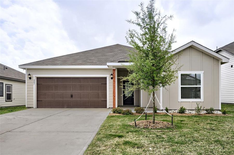 Front exterior of a new home in Creekside Estates, Terrell, TX, highlighting curb appeal (Image 1). Front exterior of a new home in Creekside Estates, Terrell, TX, highlighting curb appeal (Image 1).