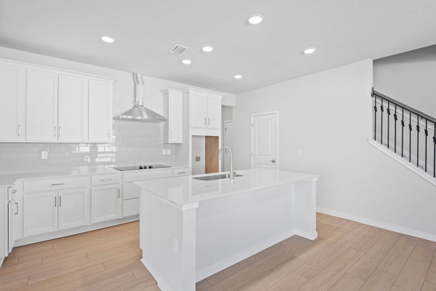 Lot 144 Chef's Kitchen with White Cabinets at Camden Woods in Kingsland Lot 144 Chef's Kitchen with White Cabinets at Camden Woods in Kingsland