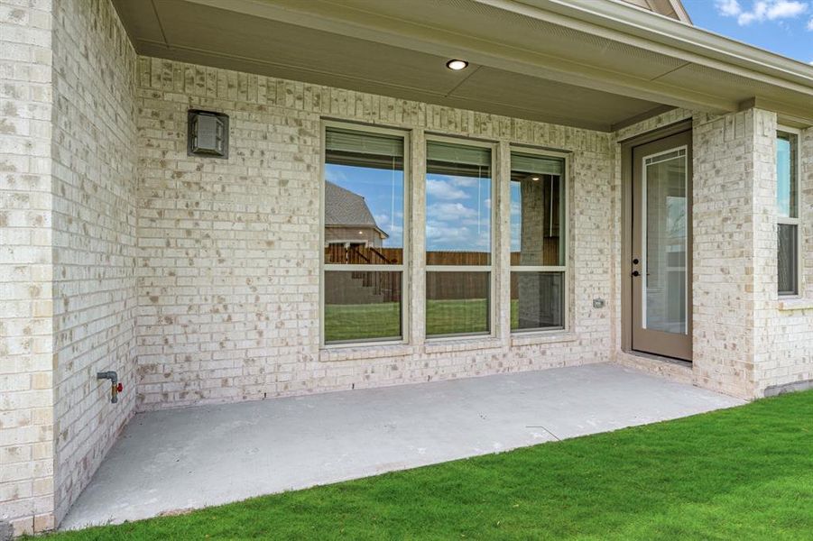 Exterior details and patio area of a home in Wildflower Ranch 60-65, Justin (Image 23). Exterior details and patio area of a home in Wildflower Ranch 60-65, Justin (Image 23).
