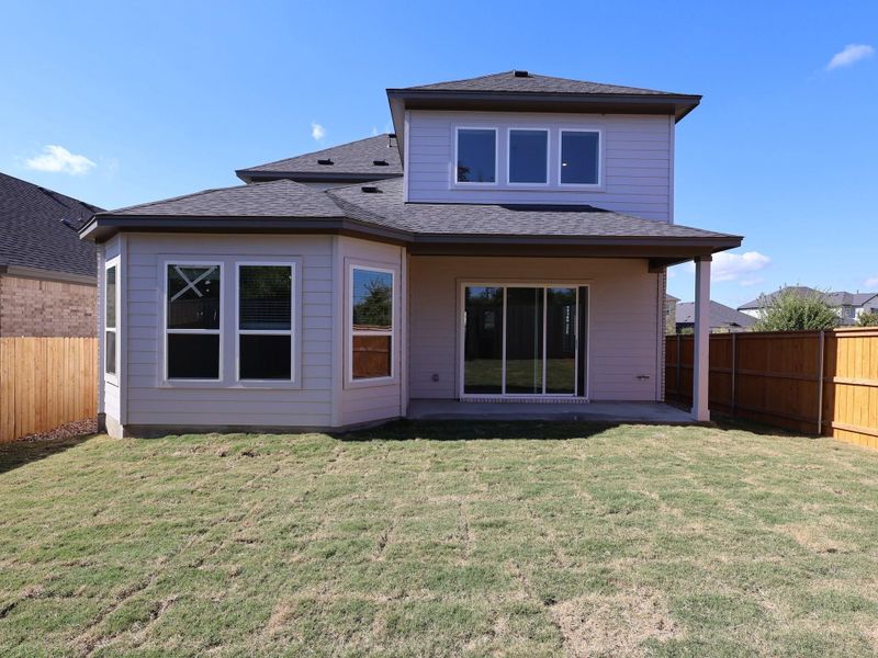 Exterior details and patio area of a home in Cedar Brook, Leander (Image 13).