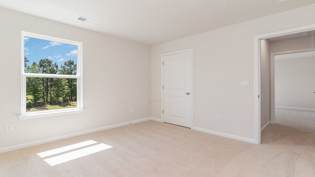 Representative unfurnished interior of a home built from the ROBIE by D.R. Horton in Sandridge Park, Little River (Image 27).