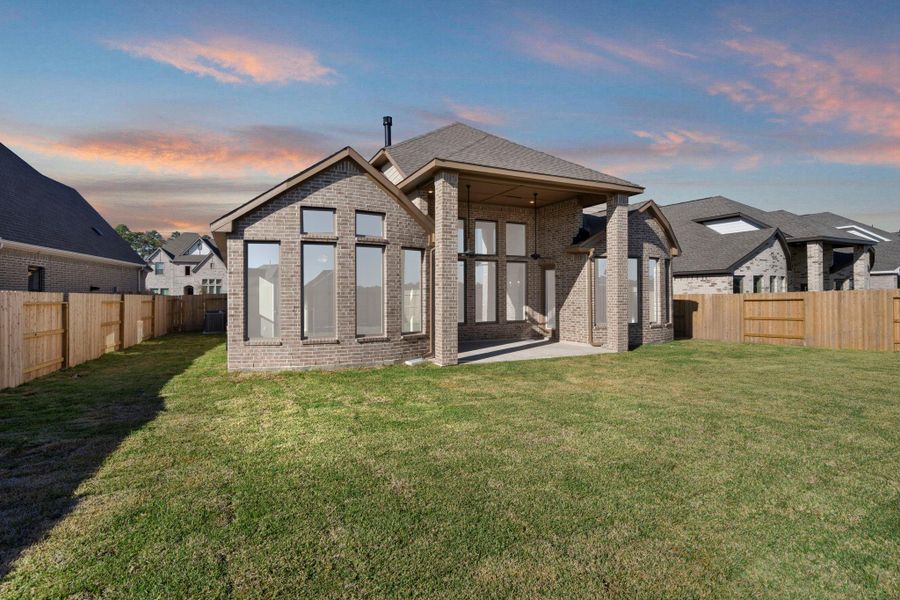Exterior details and patio area of a home in , Conroe (Image 3). Exterior details and patio area of a home in , Conroe (Image 3).