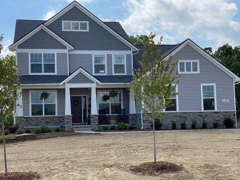 Representative exterior photo of a completed home built from the The Briarhaven III Side Entry by Norfolk Homes in Fosdick Glen of Saline, Saline, MI (Image 29).